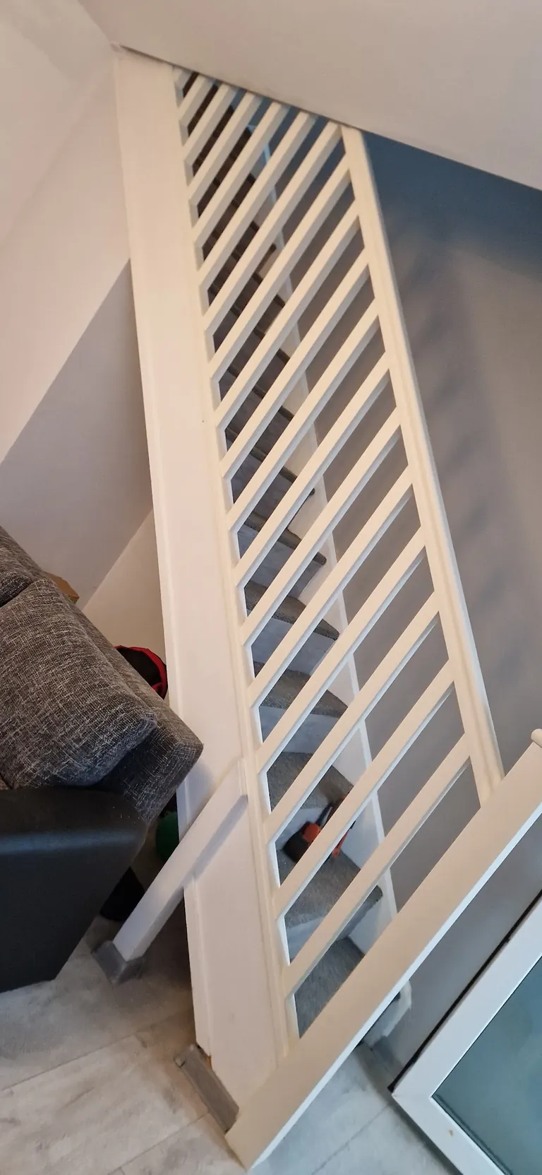 Slatted timber screen alongside a staircase